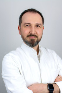 Dr. med. Mikhail Zvonik 